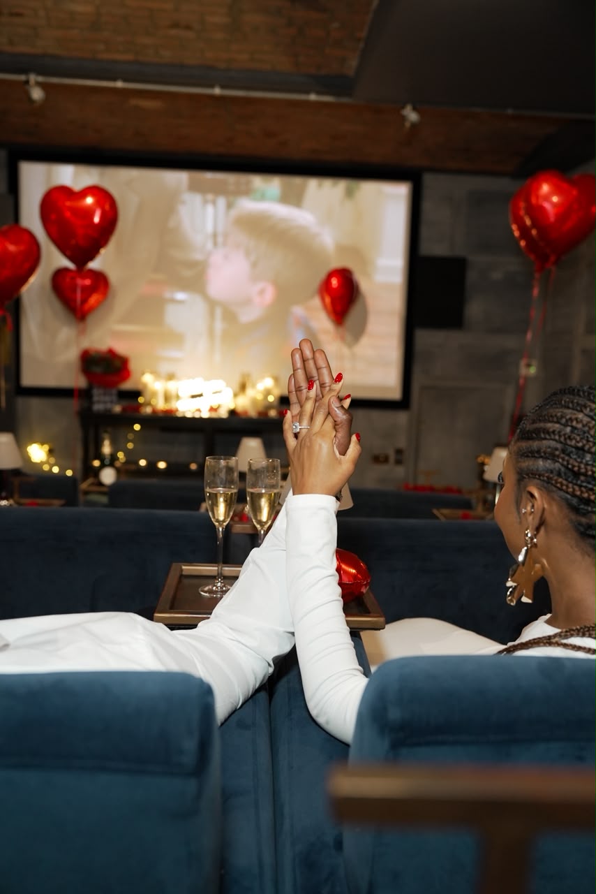 Otobong looking back during their engagement celebration